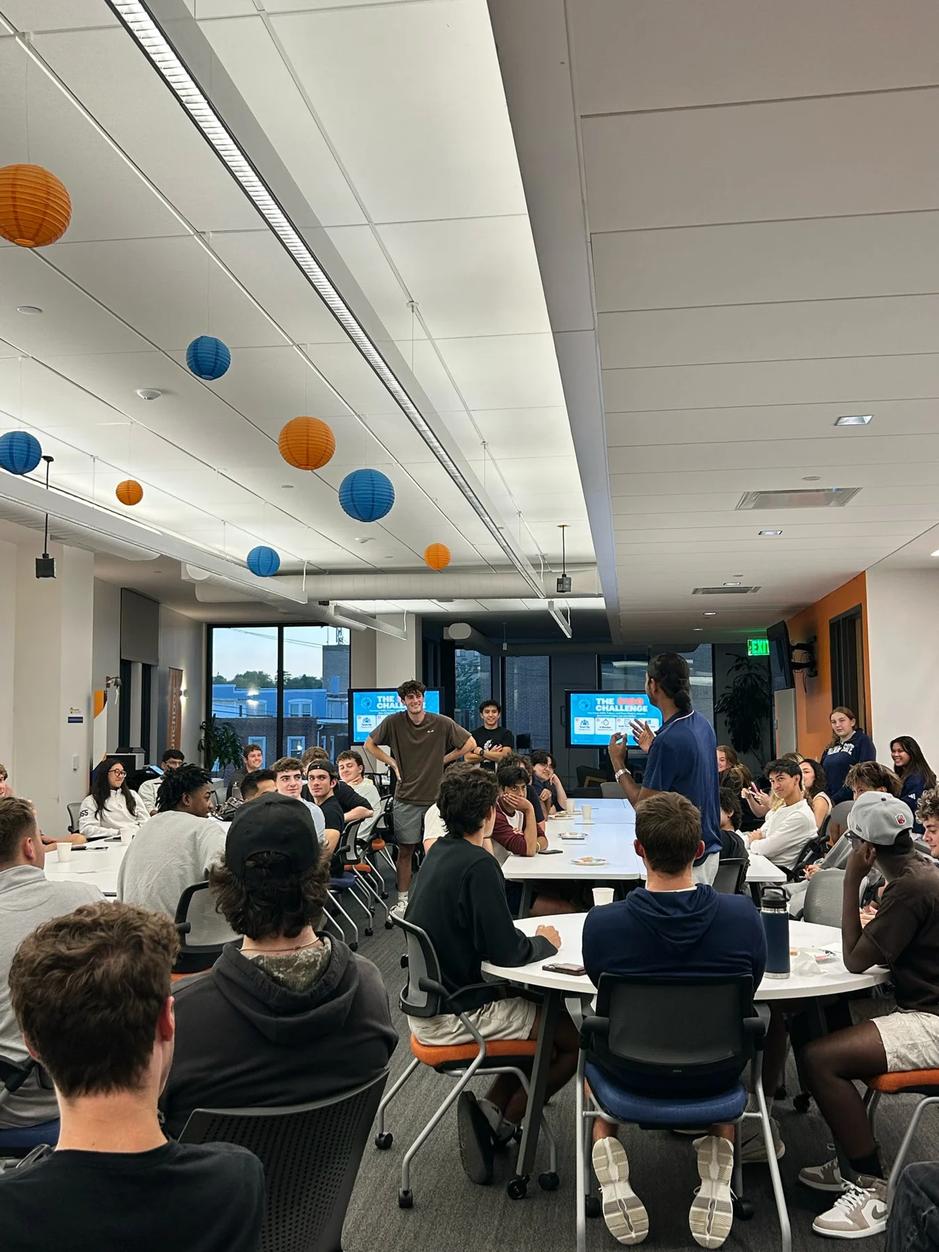 Students talking and participating at the NES kickoff meeting